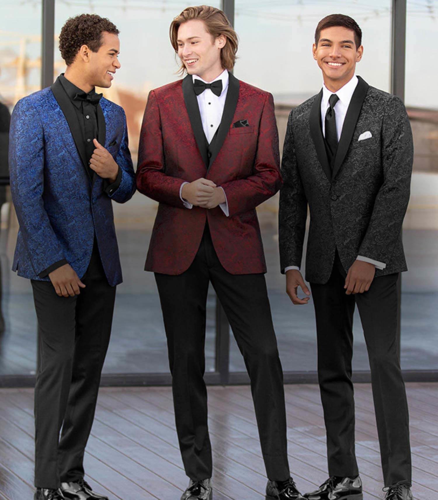 Models wearing the collections suits. Mobile image